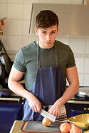 Sam Stern with his Bubinga Nakiri. Writer, cook & hunk.