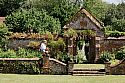 Riki walking through the sunken garden