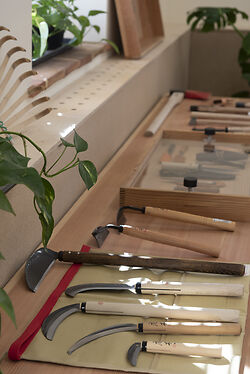 Niwaki Showroom sickles and scythes hatchets and knives bamboo hand rake