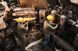 Niwaki Nata being forged in a Japanese factory