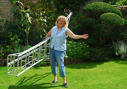 Tripod Ladders are incredibly light and easy - this is Jake's Mum with an original ten footer.