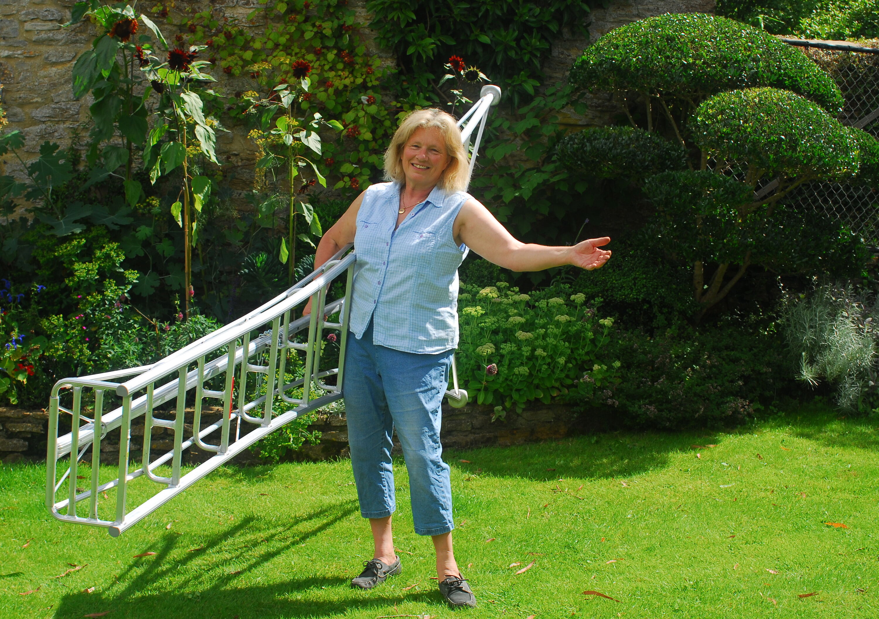Tripod Ladders are incredibly light and easy - this is Jake's Mum with an original ten footer.
